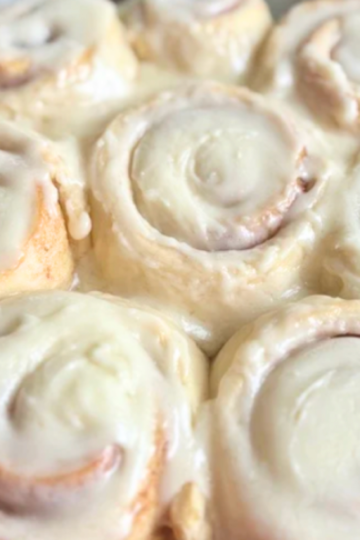 Soft and fluffy homemade 1-hour cinnamon rolls topped with creamy vanilla glaze, baked until golden and gooey.