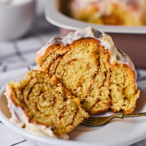 Close-up of sliced cinnamon swirl bread showing soft interior with thick brown sugar cinnamon ribbon baked throughout.