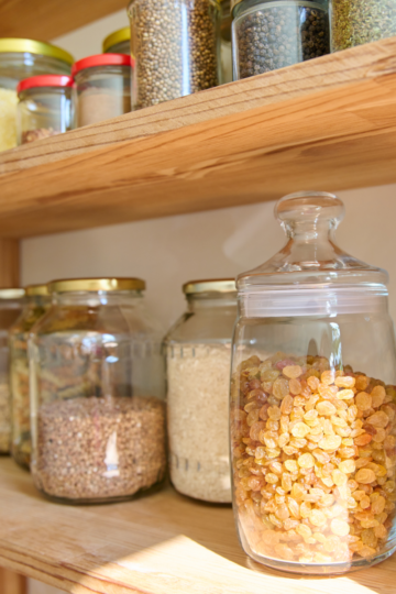 Flat lay image showing a pantry, including ingredients that are must have in every kitchen.