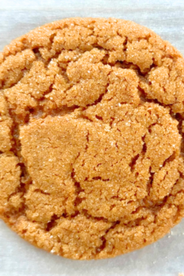 Brown butter molasses crinkle cookie with crackled sugar top.