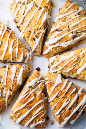 Soft and buttery cranberry scones drizzled with a light vanilla icing.