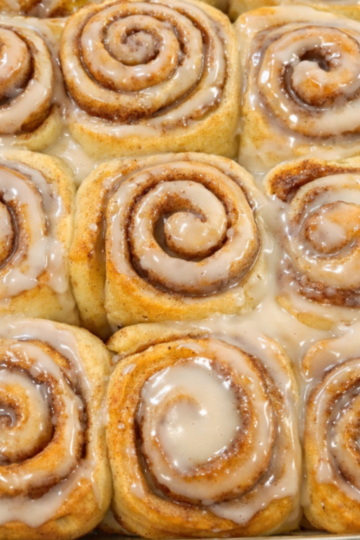 Old fashioned sourdough discard cinnamon rolls baked until soft and fluffy, swirled with cinnamon sugar and topped with a generous vanilla glaze.