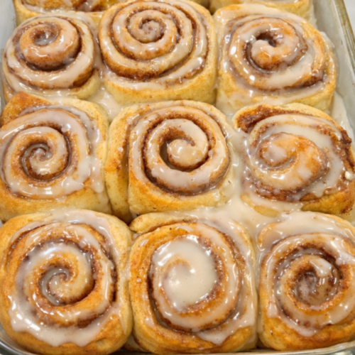 Old fashioned sourdough discard cinnamon rolls baked until soft and fluffy, swirled with cinnamon sugar and topped with a generous vanilla glaze.