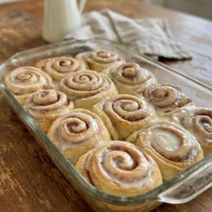 Old fashioned sourdough discard cinnamon rolls baked until soft and fluffy, swirled with cinnamon sugar and topped with a generous vanilla glaze.