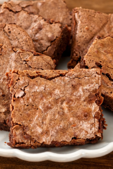 Fudgy sourdough discard brownies with crackly tops.
