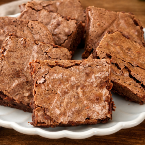 Fudgy sourdough discard brownies with crackly tops.