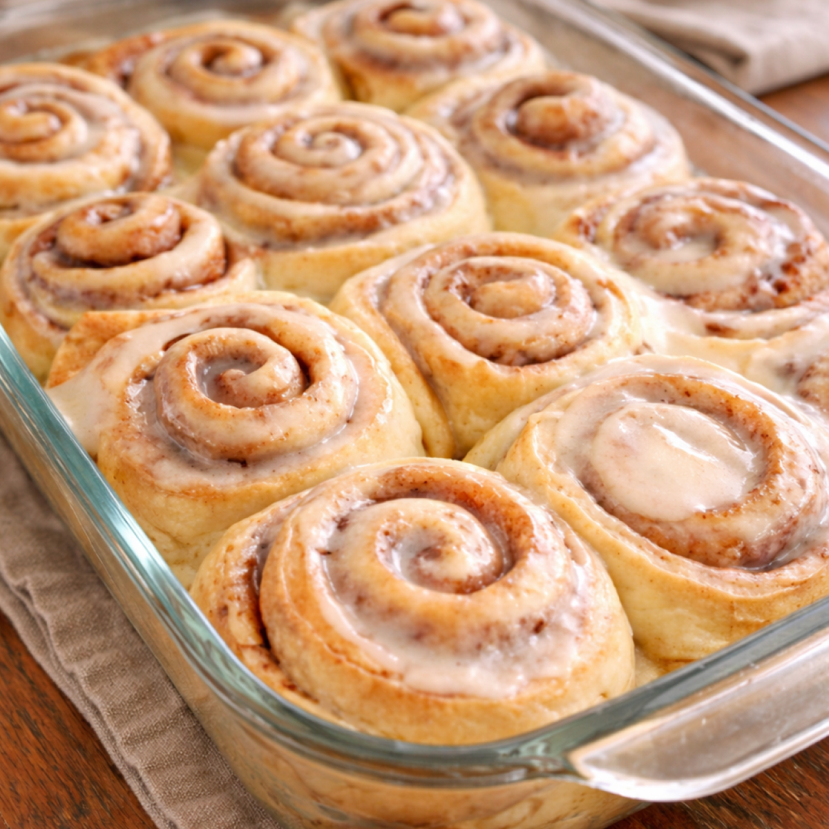 Old fashioned sourdough discard cinnamon rolls baked until soft and fluffy, swirled with cinnamon sugar and topped with a generous vanilla glaze.